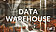 Data Warehouse, eine große Lagerhalle gefüllt mit zahlreichen Kisten