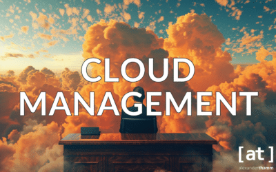 Cloud management, a manager sitting behind his desk and gazing at the evening horizon full of clouds